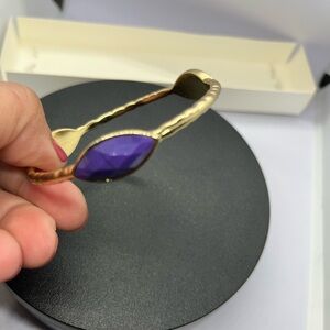 Gold Bracelet with Purple Cabochon Stone